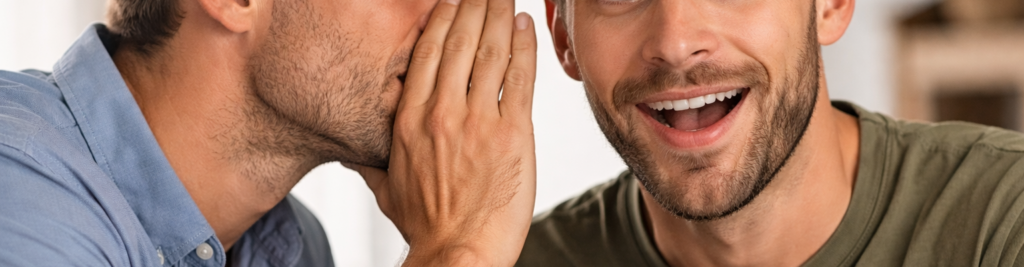 picture of one man telling a secret to another, as an allusion to the DTSA trade secret pleading.